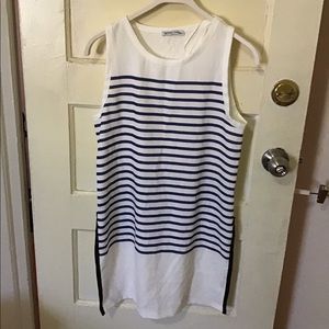 Long sleeveless tunic